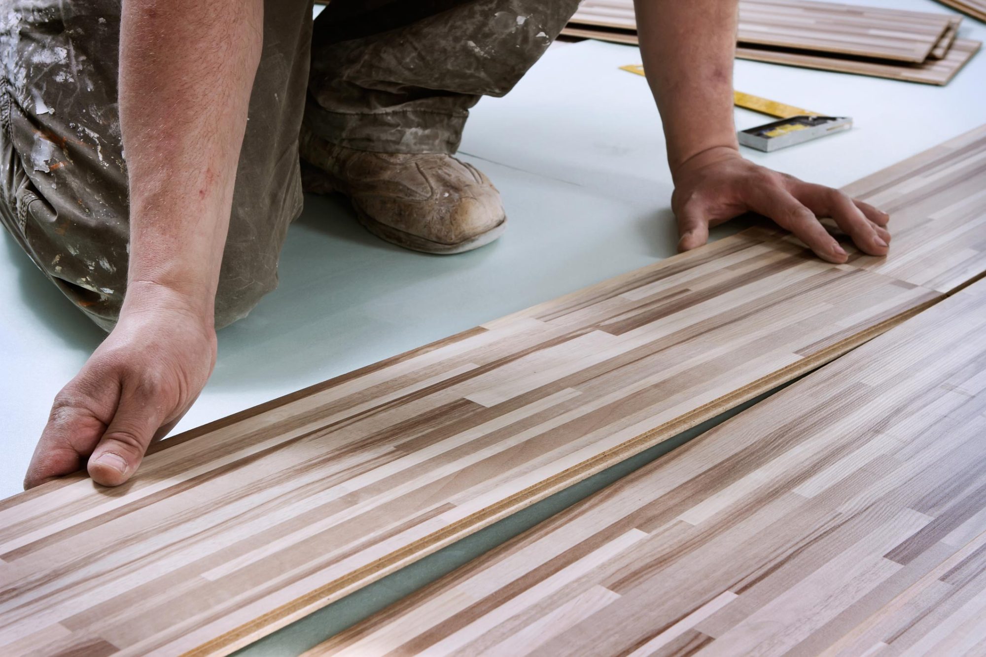 Home improvement, floor installation. Home improvement, wooden floor panels installation